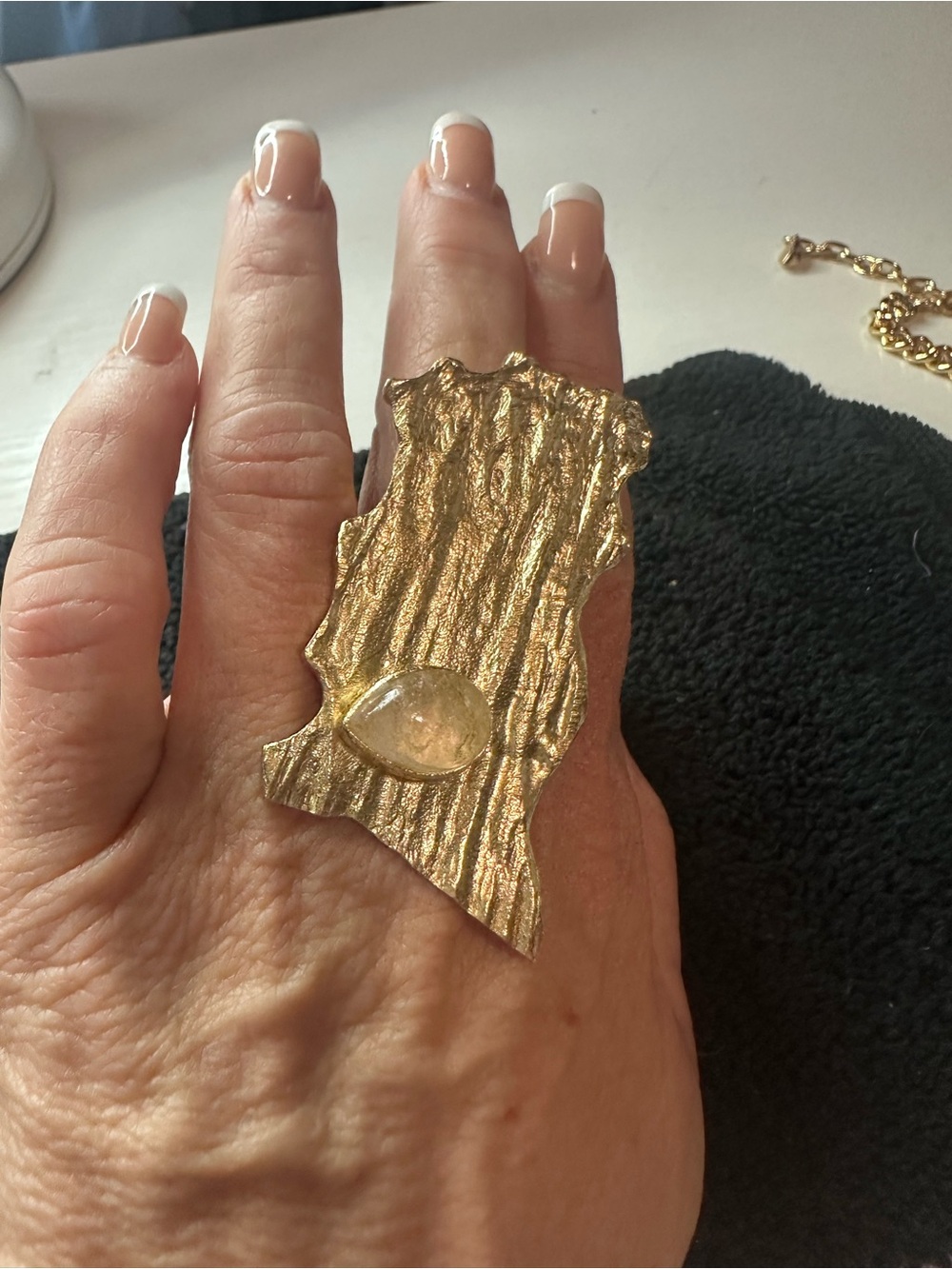 Gold Textured Artisan Statement Ring with Clear Teardrop Accent